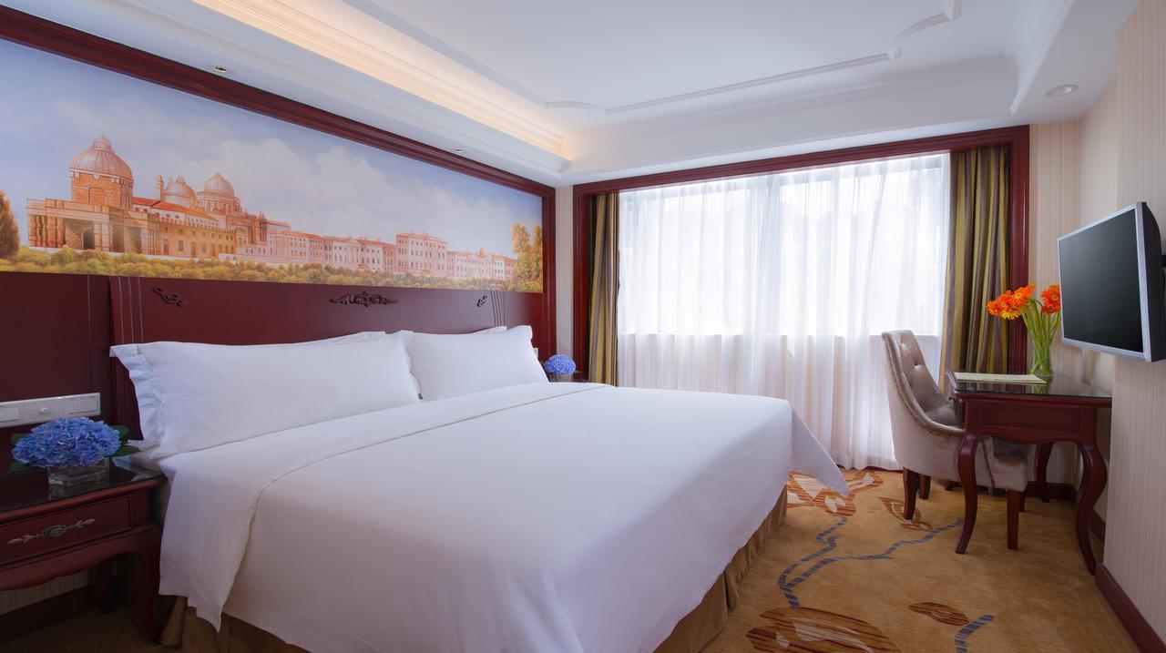 Vienna International Hotel Suzhou University Town Exterior photo